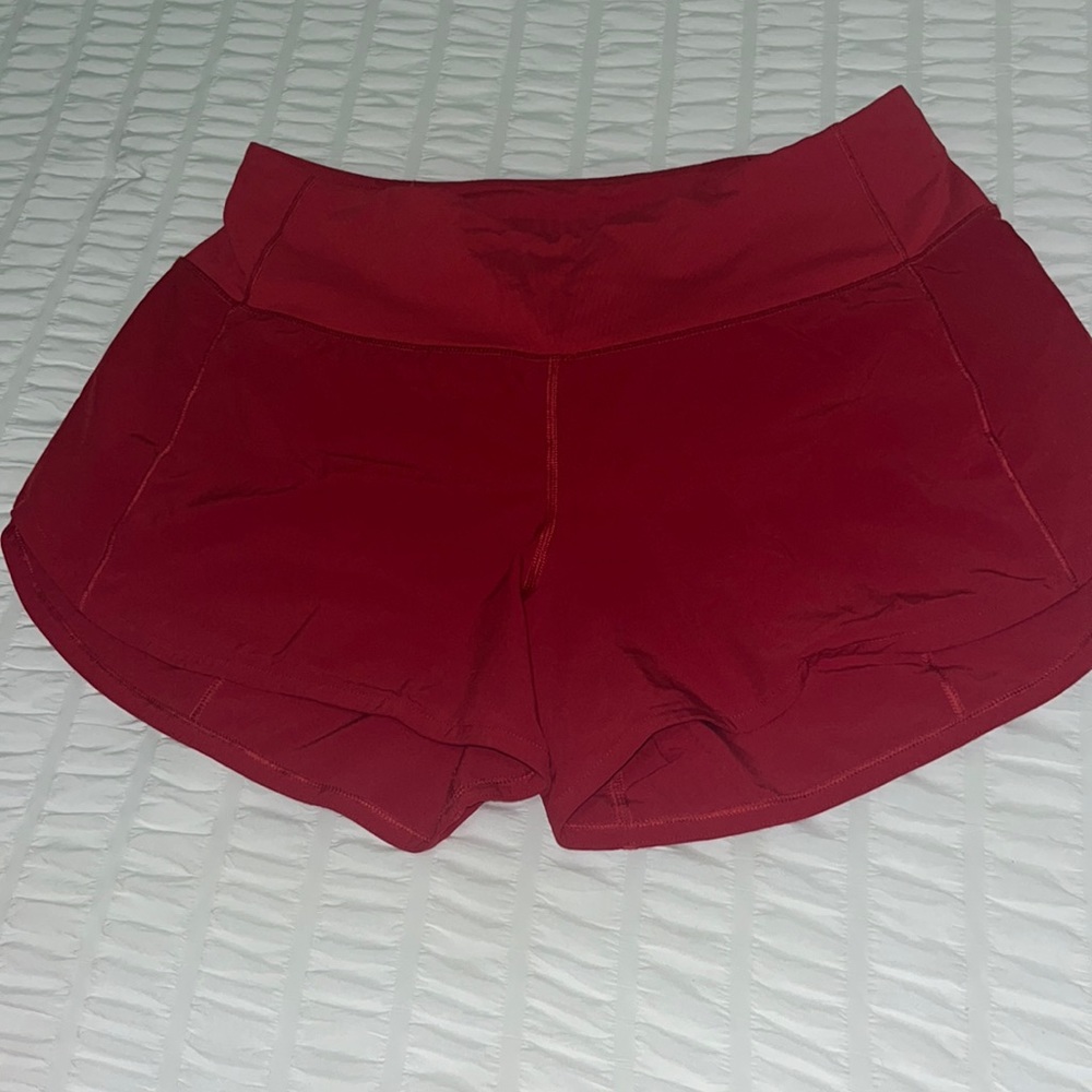 Medium rise 4 inch red lulu speed up shorts size 6